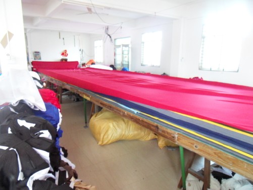 GorgeousBen cutting room where fabric is laid and cut before sewing - the first stage checked in an apparel QC report